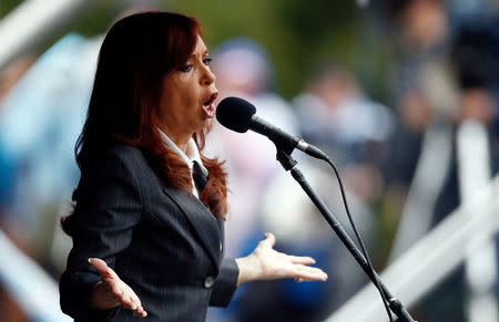 Former Argentine President Cristina Fernandez de Kirchner speaks during a rally outside a Justice building where she subpoenaed to testify, in Buenos Aires, Argentina, April 13, 2016. REUTERS/Marcos Brindicci