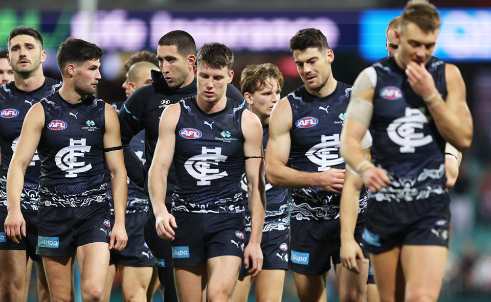 Carlton players, pictured here after their massive loss to the Sydney Swans.