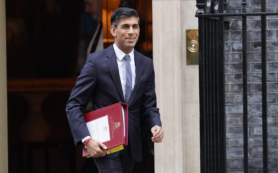 Rishi Sunak, the Prime Minister, leaves 10 Downing Street this morning ahead of PMQs - James Manning/PA