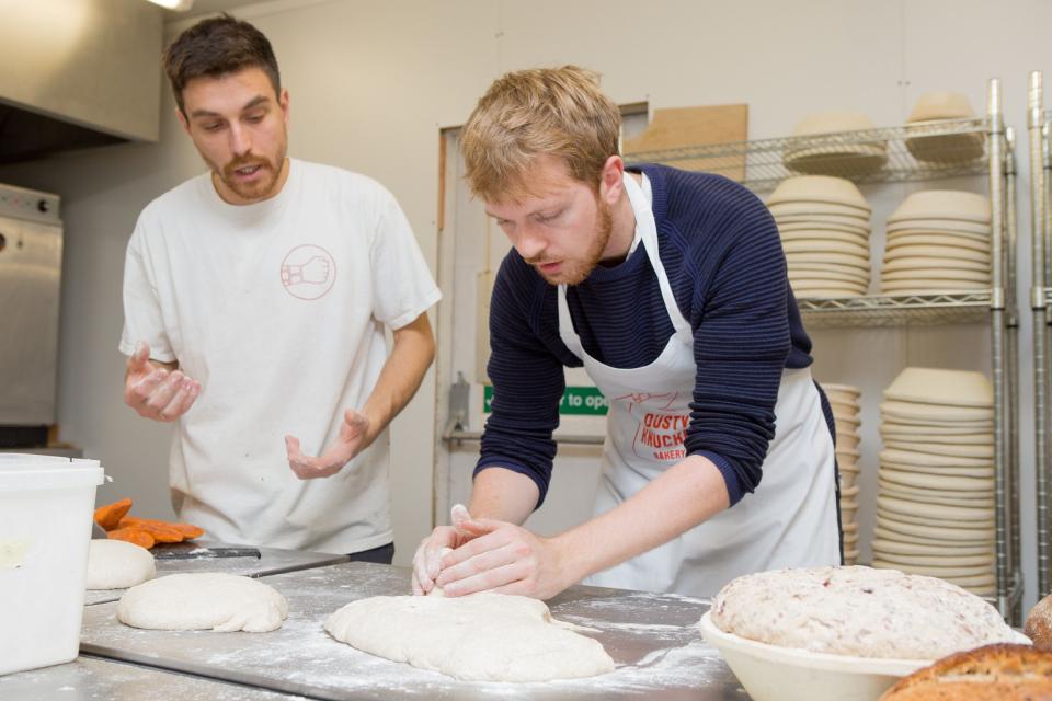 Bread ahead: Samuel kneading his dough with Dusty Knuckles’ school co-ordinator, Tomek Mossakowski (Matt Writtle)