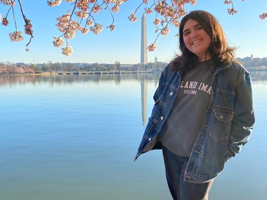 Jenna Bloom standing in front of Washington monument in DC