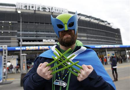 A Seattle Seahawks fan poses outside the stadium before the start of the NFL Super Bowl XLVIII football game against the Denver Broncos in East Rutherford, New Jersey, February 2, 2014. REUTERS/Shannon Stapleton