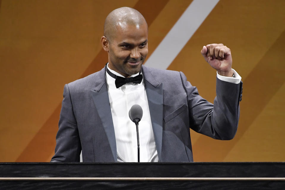 Tony Parker gestures during his enshrinement at the Basketball Hall of Fame, Saturday, Aug. 12, 2023, in Springfield, Mass. (AP Photo/Jessica Hill)