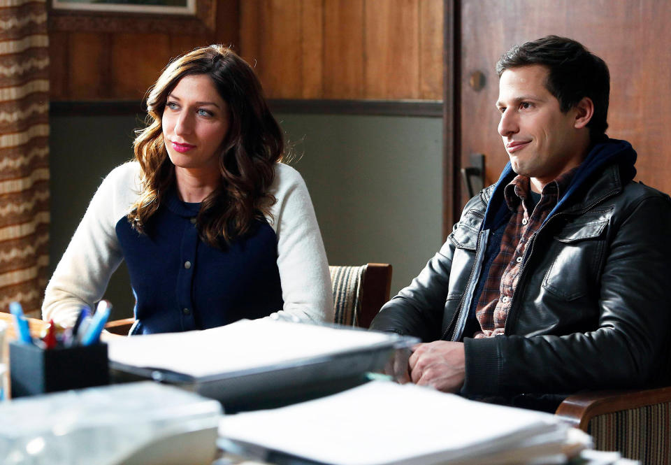 Chelsea Peretti and Andy Samberg are pictured in a 2014 episode of "Brooklyn Nine-Nine" called "The Apartment"