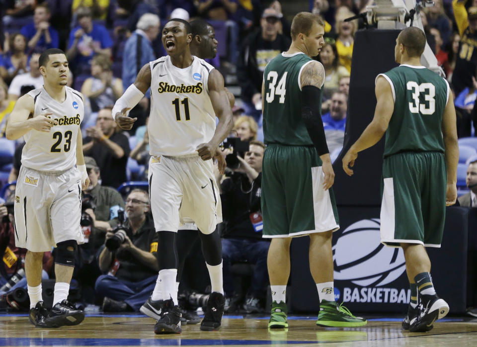 Wichita State forward Cleanthony Early (11) celebrates against Cal Poly during the first half of a second-round game in the NCAA college basketball tournament Friday, March 21, 2014, in St. Louis. (AP Photo/Jeff Roberson)