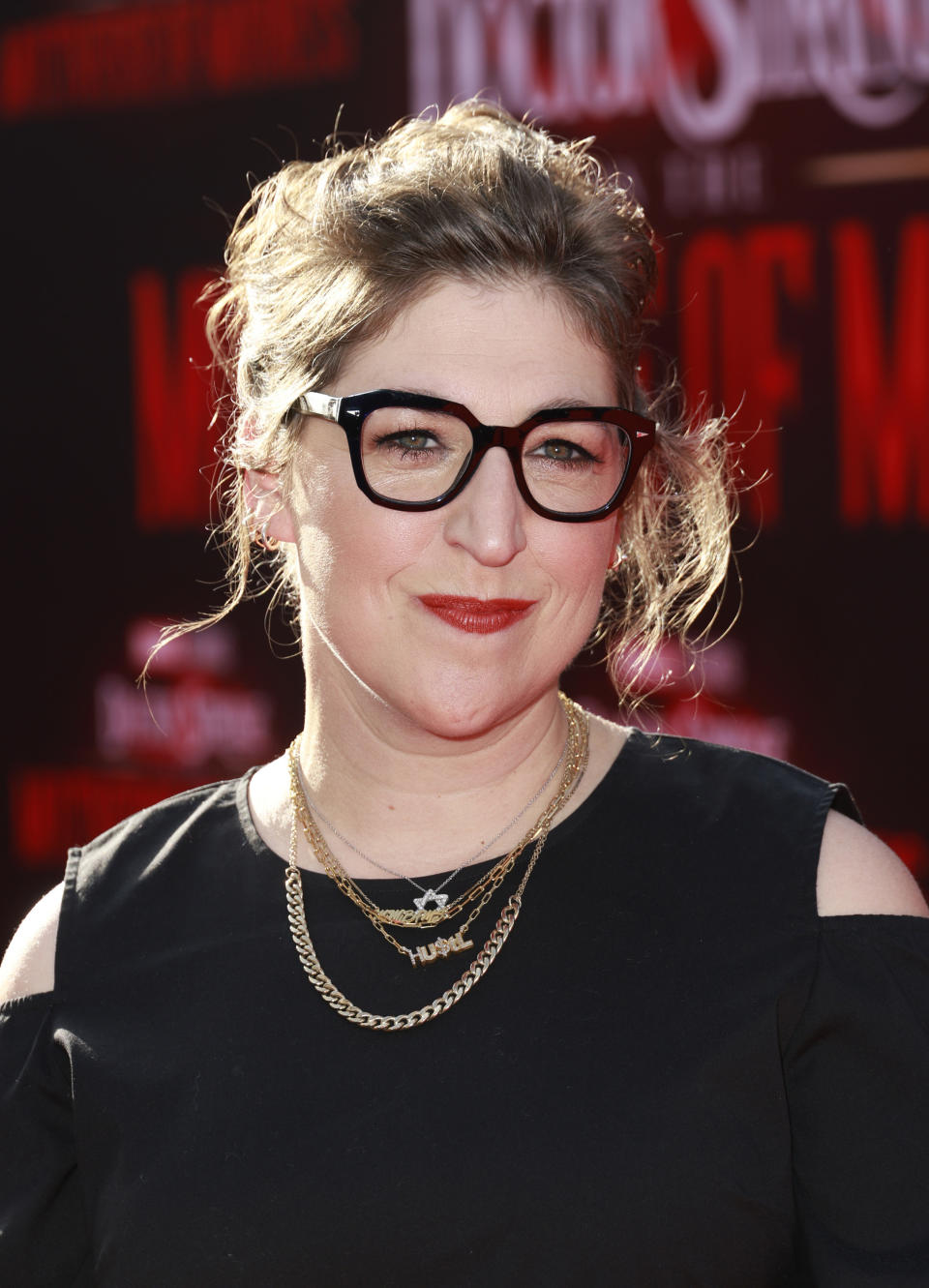 close up of Mayim smiling