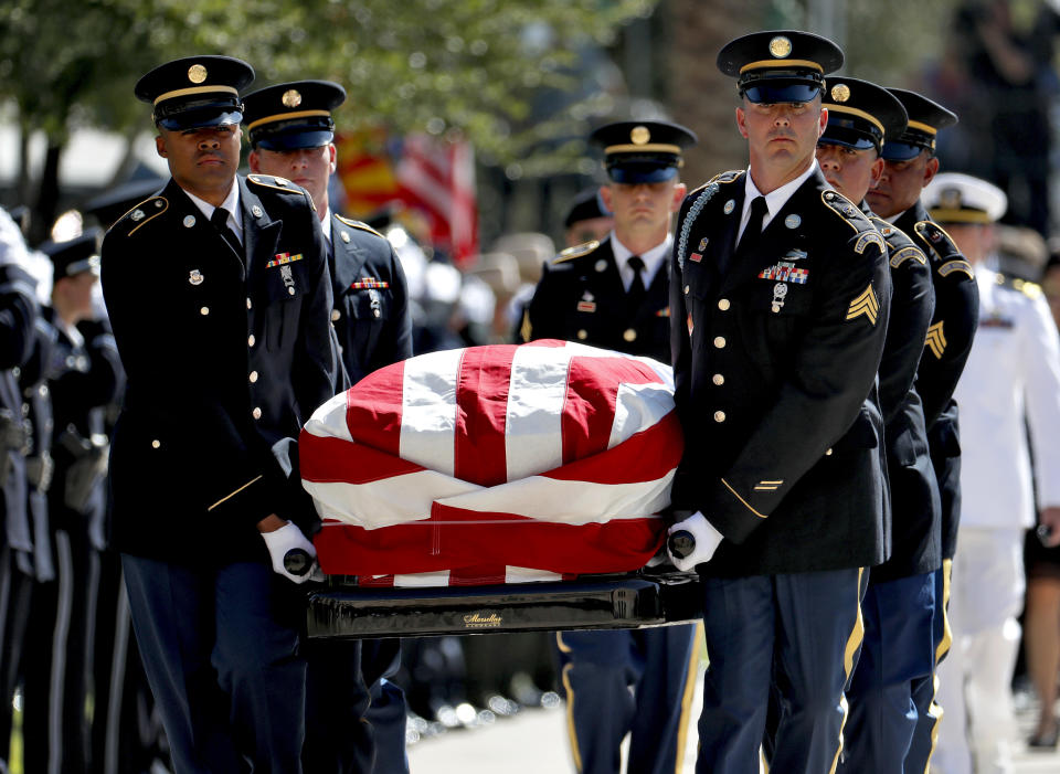 <p>Military personal carry the casket of Sen. John McCain, R-Ariz., into the Capitol rotunda for a memorial service, Wednesday, Aug. 29, 2018, at the Capitol in Phoenix. (Photo: Matt York/AP) </p>