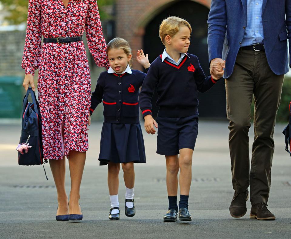 Britain's Princess Charlotte of Cambridge, with her brother, Britain's Prince George of Cambridge, arrives for her first day of school at Thomas's Battersea in London on September 5, 2019. (Photo by Aaron Chown / POOL / AFP)        (Photo credit should read AARON CHOWN/AFP via Getty Images)