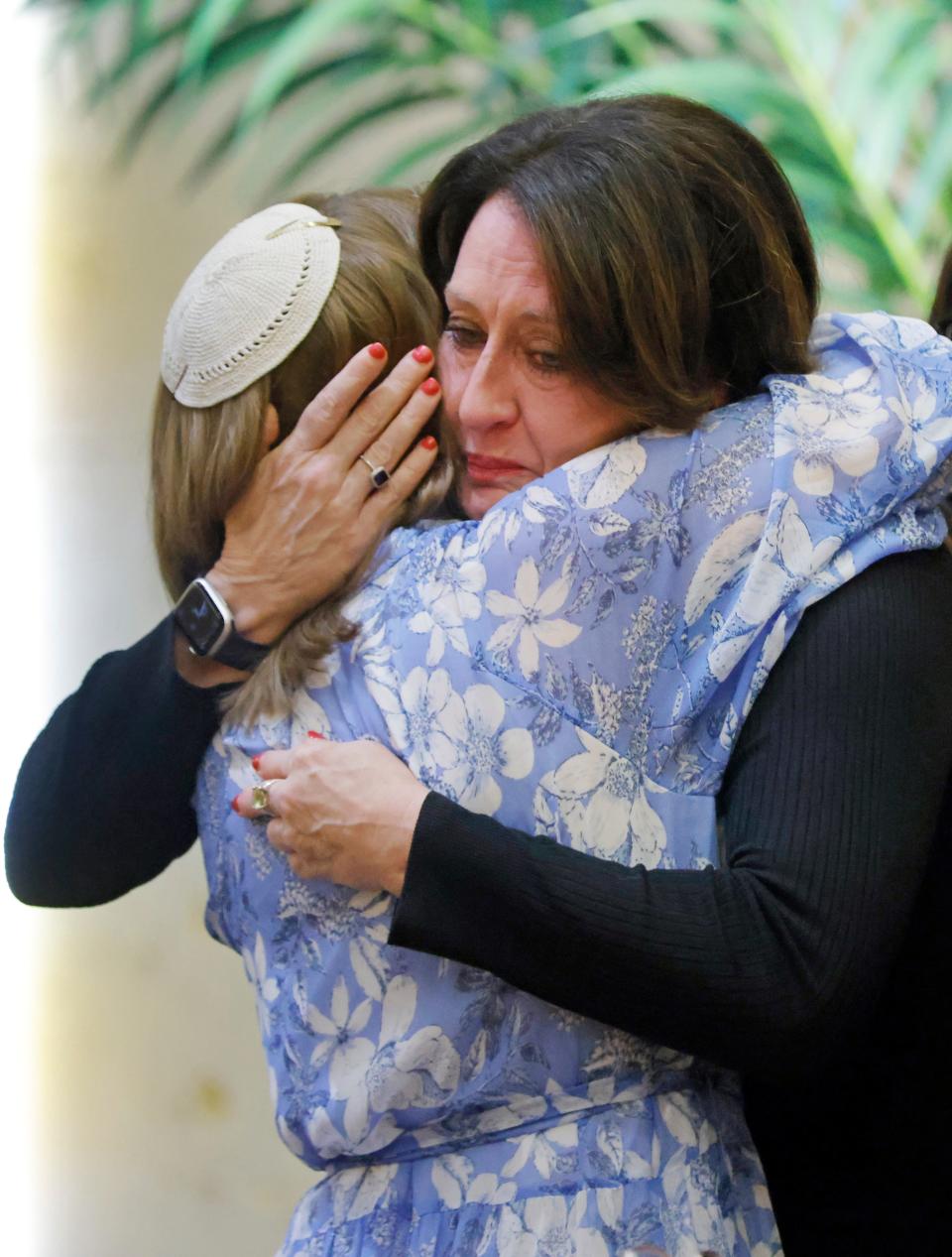 Rabbi Vered Harris of Temple B'nai Israel, left, hugs Kasi Shelton, executive director of University of Oklahoma Hillel, on Thursday at the end of the  Prayer Vigil for Israel at Temple B'nai Israel in Oklahoma City.