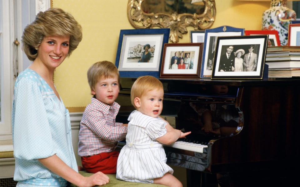 Princess Diana with Prince William and Harry