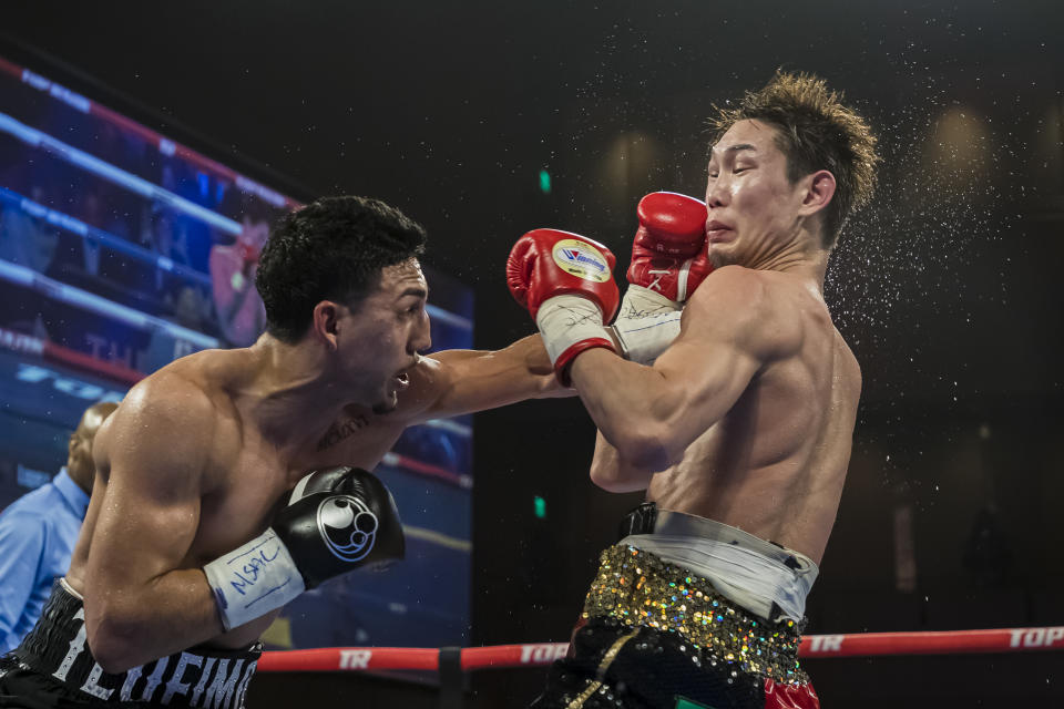 OXON HILL, MD - JULY 19: Teofimo Lopez punches Masayoshi Nakatani during the eleventh round of their lightweight IBF World Title Elimination fight at The Theater at MGM National Harbor on July 19, 2019 in Oxon Hill, Maryland. (Photo by Scott Taetsch/Getty Images)