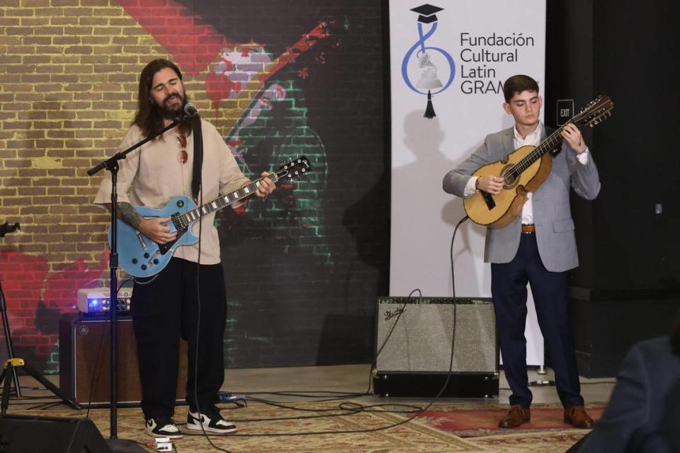 2019 Latin Recording Academy Person of the Year recording artist Juanes performs with the winner of Juanes Scholarship, Xavier Cintrón, right, on Tuesday, July 13, 2021, in Miami.
.