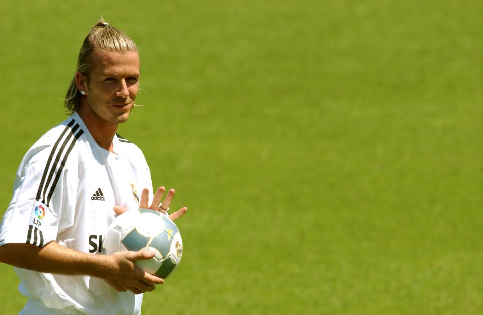 David Beckham is all smiles after signing for Real Madrid  (Photo by Matthew Ashton/EMPICS via Getty Images)