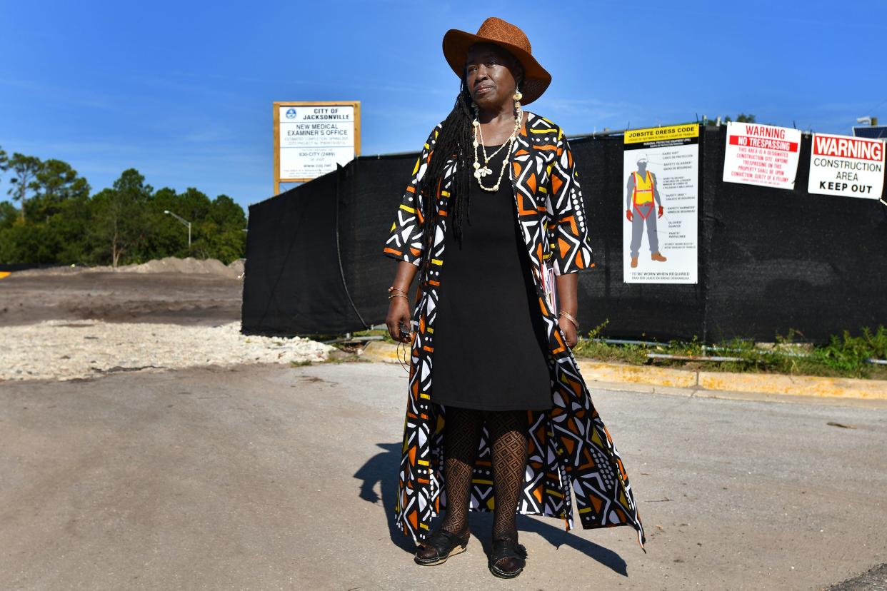 Brentwood resident and community activist Lydia Bell stands outside one of the construction entrances to the new Medical Examiner's Office being built off Golfair Road next to a neighborhood of single-family homes. She said residents oppose the project but the city didn't tell them about it until crews were clearing the site for construction.