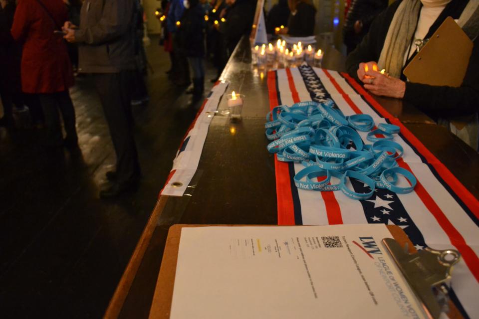 The League of Women Voters of Newport County organized a Votes not Violence candlelight vigil to commemorate the anniversary of the January 6, 2020 storming of the US Capitol.