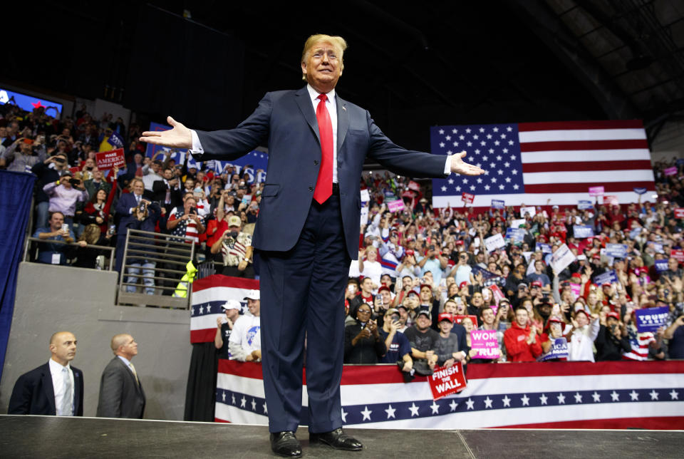 President Donald Trump arrives for a rally at Allen County War Memorial Coliseum, Monday, Nov. 5, 2018, in Fort Wayne, Ind. (AP Photo/Carolyn Kaster)