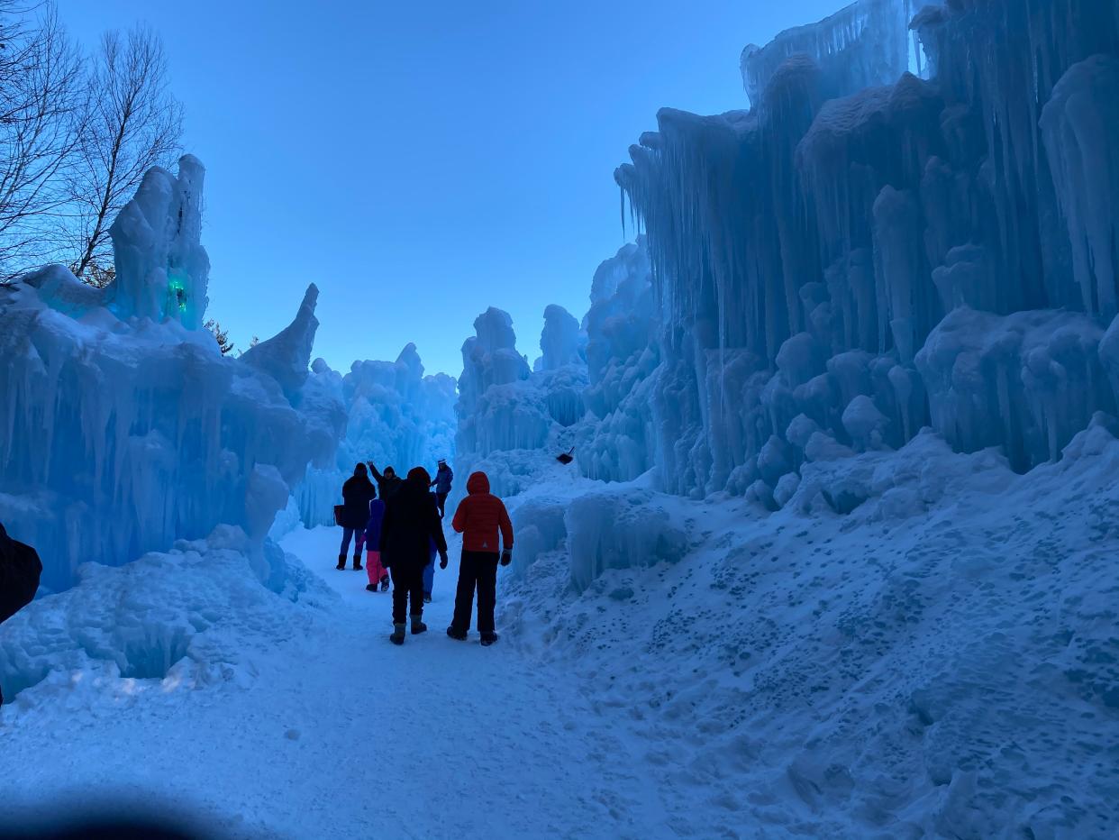 Walking through the Ice Castle in North Woodstock, New Hampshire.