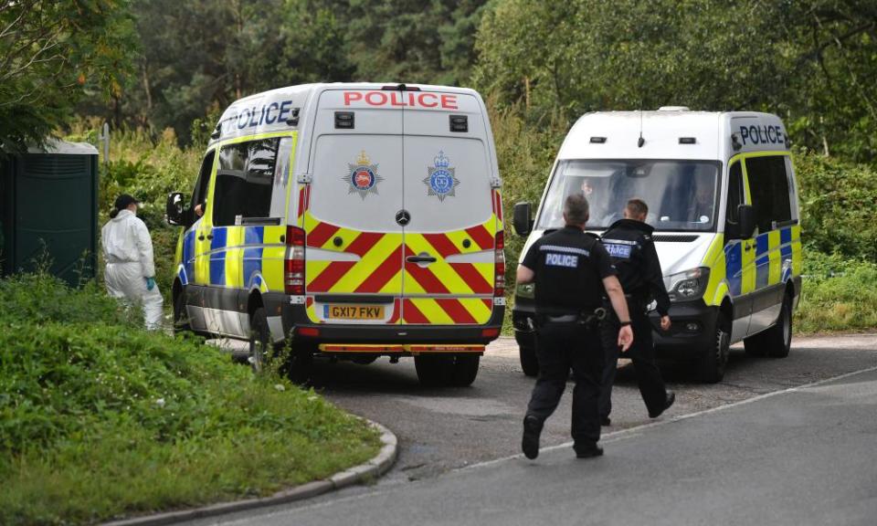 Police vans were blocking the entrance to the caravan site on Padworth Road as part of the investigation.