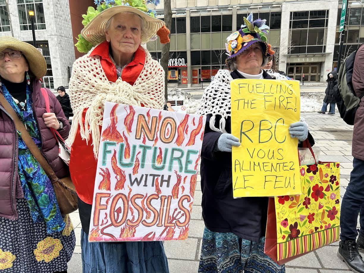 Protesters gathered Saturday outside the Royal Bank of Canada's main office in Montreal, one of several demonstrations held across the country.  (Kwabena Oduro/CBC - image credit)