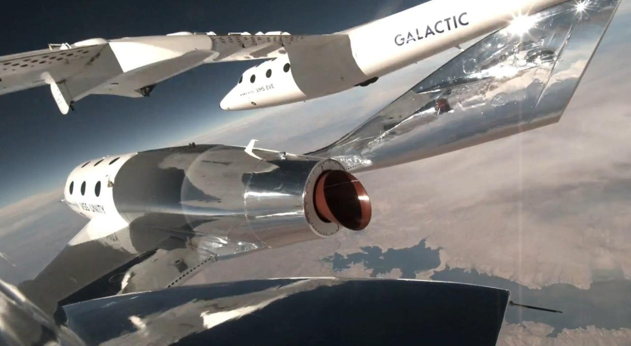 Virgin Galactic's Unity spaceship releases from the carrier aircraft, above, during an August 2023 spaceflight carrying its first paid tourists