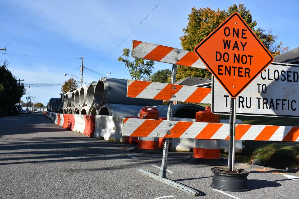 Concrete storm drain pipe pieces line Sylvis Street in Downtown Dickson.