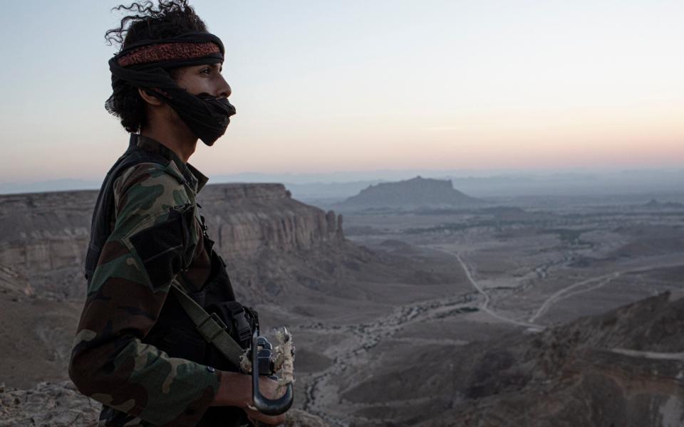 A soldier looks out toward Ataq from Al Sawt on the Hawframat Plateau, in Shabwa Province, Yemen - Sam Tarling / The Sana'a Centre