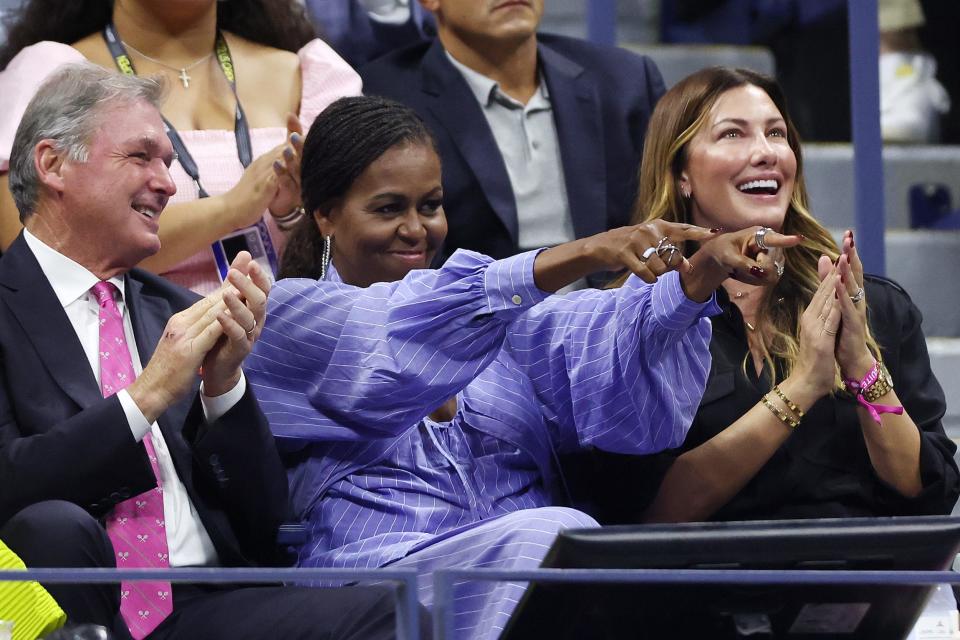 Former First Lady Michelle Obama supports American Frances Tiafoe during his US Open semifinal match.