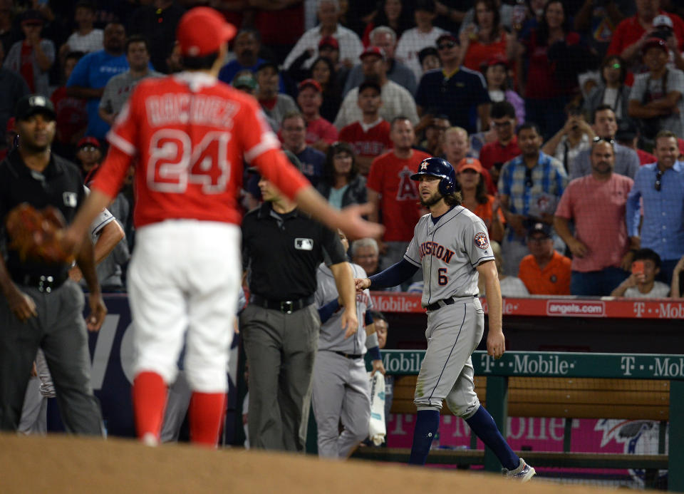 Los Angeles Angels relief pitcher Noe Ramirez (24) reacts toward the Houston Astros bench during the sixth inning after center fielder Jake Marisnick (6) was hit by pitch at Angel Stadium of Anaheim. (Gary A. Vasquez-USA TODAY Sports)