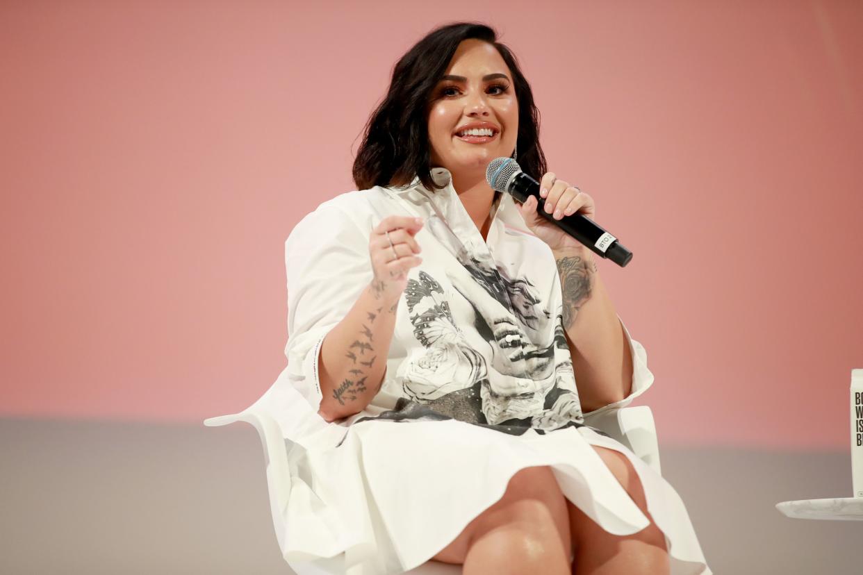 Demi Lovato is all smiles at a panel event