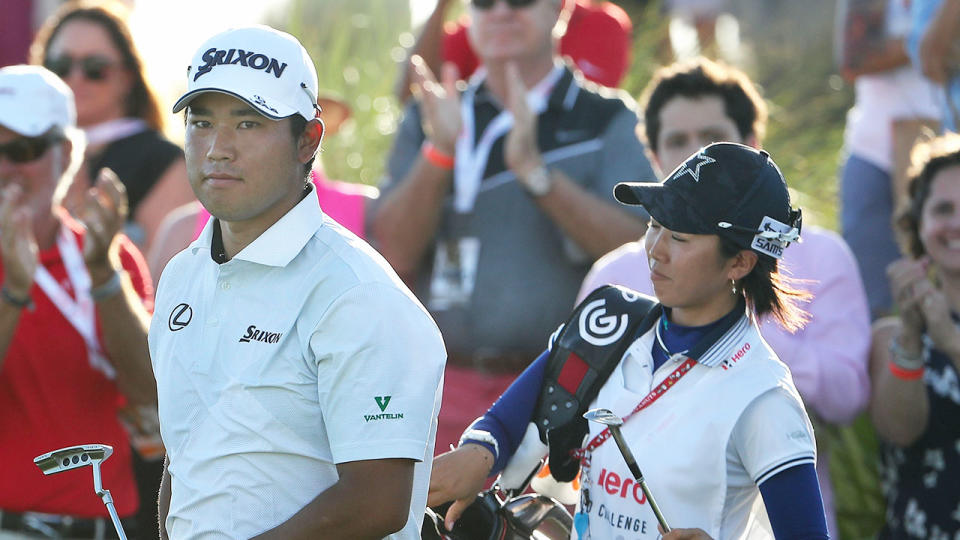 Pictured here, Hideki Matsuyama with caddie Mei Inui at the 2016 Hero World Challenge. 