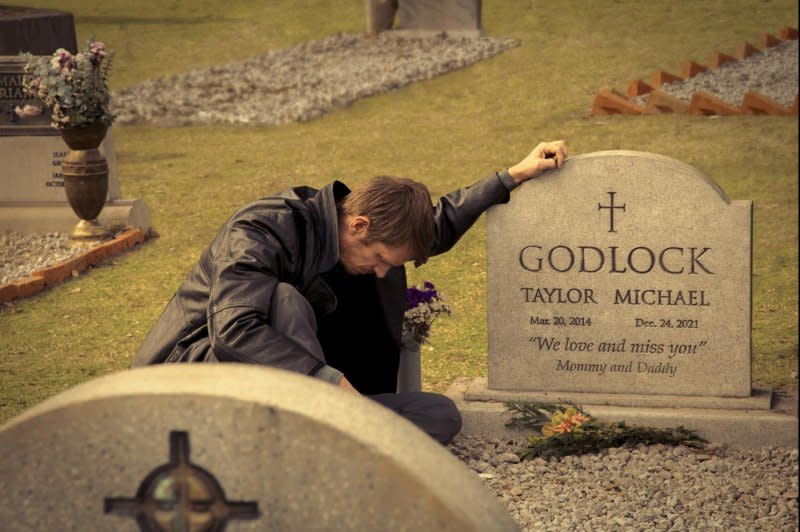 Brian (Joel Kinnaman) mourns his son in "Silent Night." Photo courtesy of Lionsgate