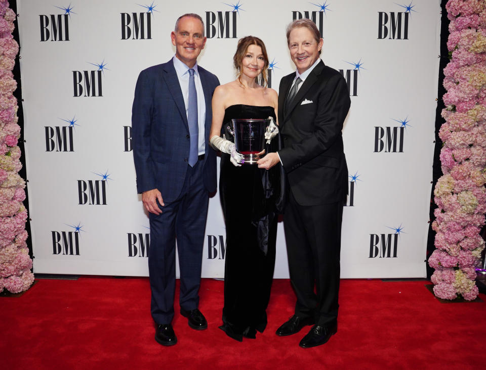 NASHVILLE, TENNESSEE - NOVEMBER 07: (L-R) BMI President & CEO, Mike O'Neill, Matraca Berg and BMI Vice President, Creative, Nashville, Clay Bradley attends the 2023 BMI Country Awards at BMI Nashville on November 07, 2023 in Nashville, Tennessee. (Photo by Erika Goldring/Getty Images for BMI)