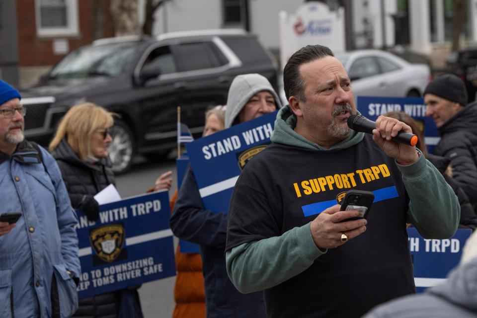 Resident Phillip Brilliant speaks at the Jan. 31, 2024, rally protesting a plan to cut captains’ jobs in the Toms River police department.