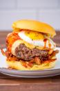 <p>Everything's better when you put an egg on it.</p><p>Get the recipe from <a href="https://www.delish.com/cooking/recipe-ideas/recipes/a47644/cheesy-breakfast-burger-recipe/" rel="nofollow noopener" target="_blank" data-ylk="slk:Delish;elm:context_link;itc:0;sec:content-canvas" class="link ">Delish</a>.</p>