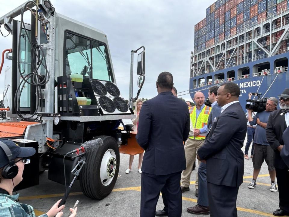 Onlookers check out new developments in truck technology aimed at making more efficient, cleaner trucking.
