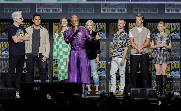 PHOTO: From left, James Gunn, Chris Pratt, Karen Gillan, Chukwudi Iwuji, Pom Klementieff, Sean Gunn, Will Poulter, and Maria Bakalova speak onstage during Comic-Con, July 23, 2022, in San Diego, Calif. (Kevin Winter/Getty Images)