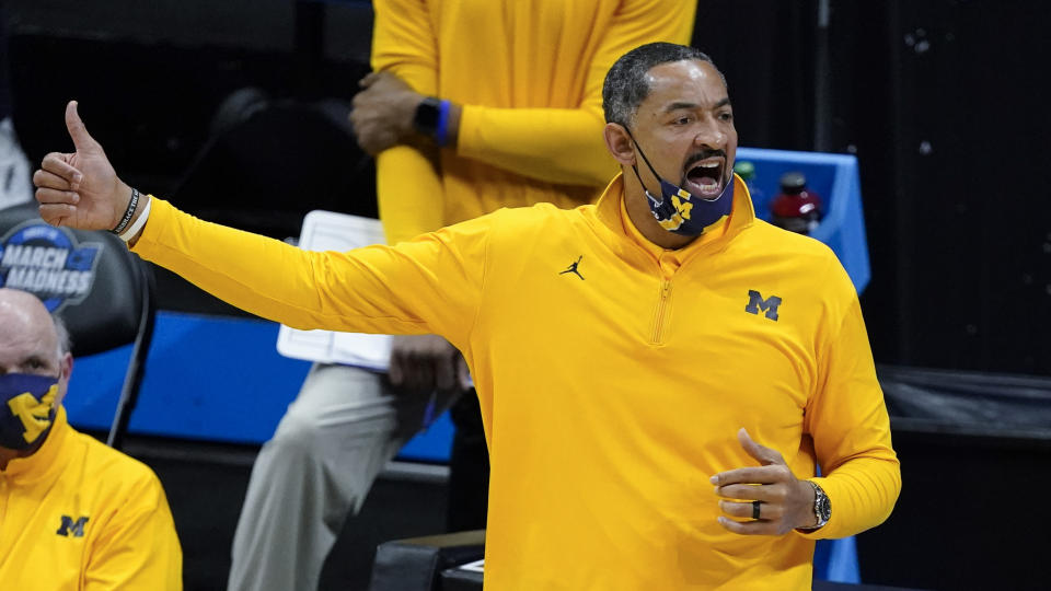 Michigan head coach Juwan Howard directs his team during the first half of an Elite 8 game against UCLA in the NCAA men's college basketball tournament at Lucas Oil Stadium, Tuesday, March 30, 2021, in Indianapolis. (AP Photo/Darron Cummings)