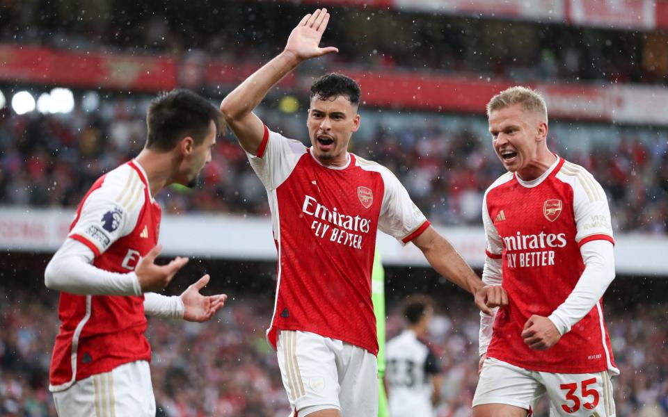 Gabriel Martinelli and Oleksandr Zinchenko of Arsenal celebrate after their side is awards a penalty during the Premier League match between Arsenal FC and Fulham FC at Emirates Stadium on August 26, 2023 in London, England