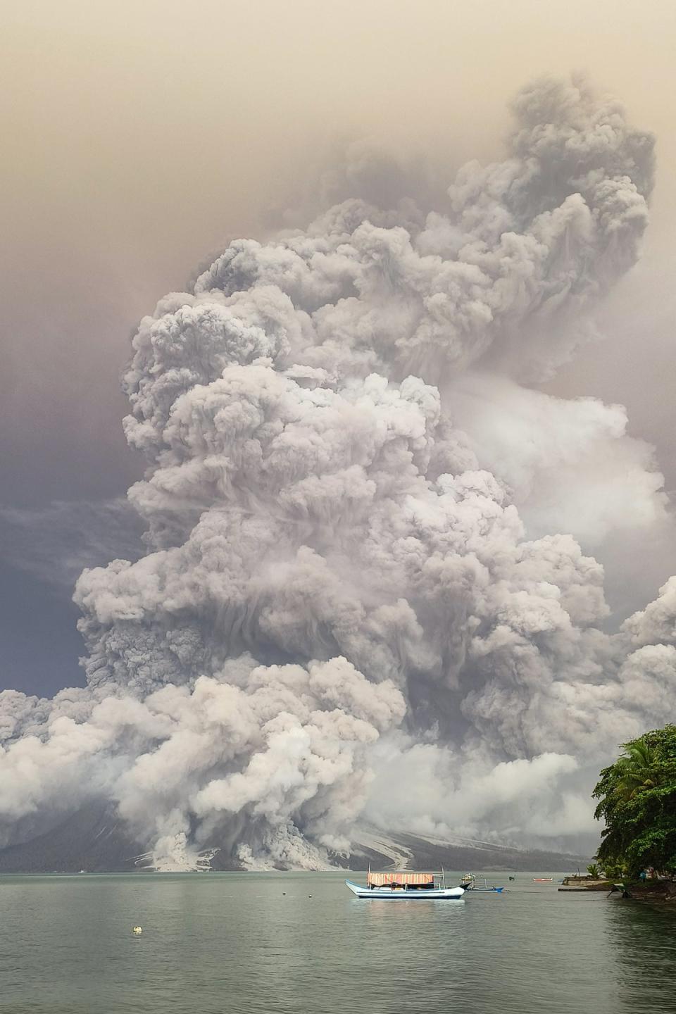 An eruption from Mount Ruang volcano is seen from Tagulandang island in Sitaro, North Sulawesi (AFP via Getty)