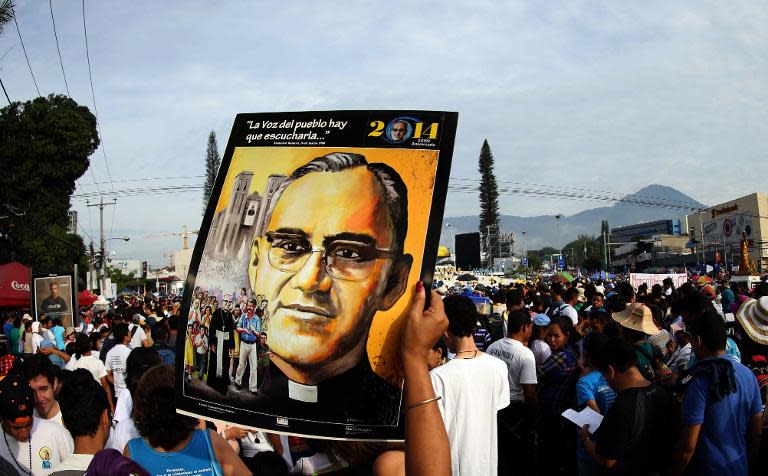 Catholics participate in a mass celebrating the beatification of Salvadorean archbishop Oscar Romero at the Salvador del Mundo square in San Salvador on May 23, 2015