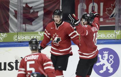 Canada&#39;s Thomas Chabot, Dylan Strome and Jake Virtanen celebrate Strome&#39;s 2-1 goal during the 2016 IIHF World Junior U20 Ice Hockey Championships tournament match Switzerland vs Canada in Helsinki, Finland December 29, 2015.   REUTERS/Heikki Saukkomaa/Lehtikuva    ATTENTION EDITORS - THIS IMAGE WAS PROVIDED BY A THIRD PARTY. FOR EDITORIAL USE ONLY. NOT FOR SALE FOR MARKETING OR ADVERTISING CAMPAIGNS. THIS PICTURE IS DISTRIBUTED EXACTLY AS RECEIVED BY REUTERS, AS A SERVICE TO CLIENTS. NO THIRD PARTY SALES. NOT FOR USE BY REUTERS THIRD PARTY DISTRIBUTORS. FINLAND OUT. NO COMMERCIAL OR EDITORIAL SALES IN FINLAND.