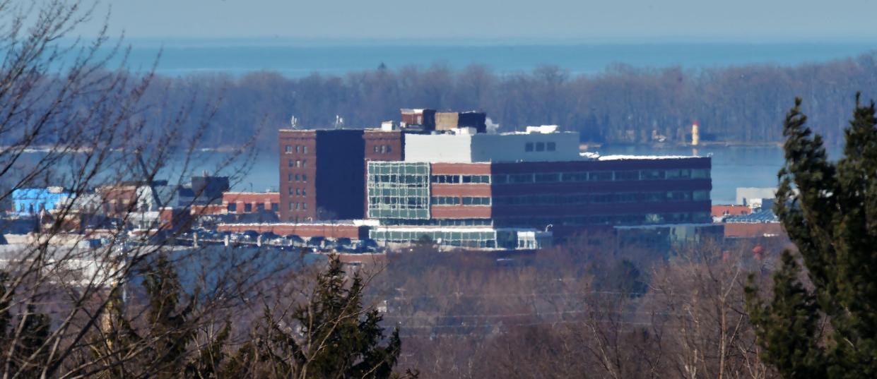 The new Erie Insurance Hagen Building, center, can be seen near Presque Isle State Park and Lake Erie, top, in Erie.