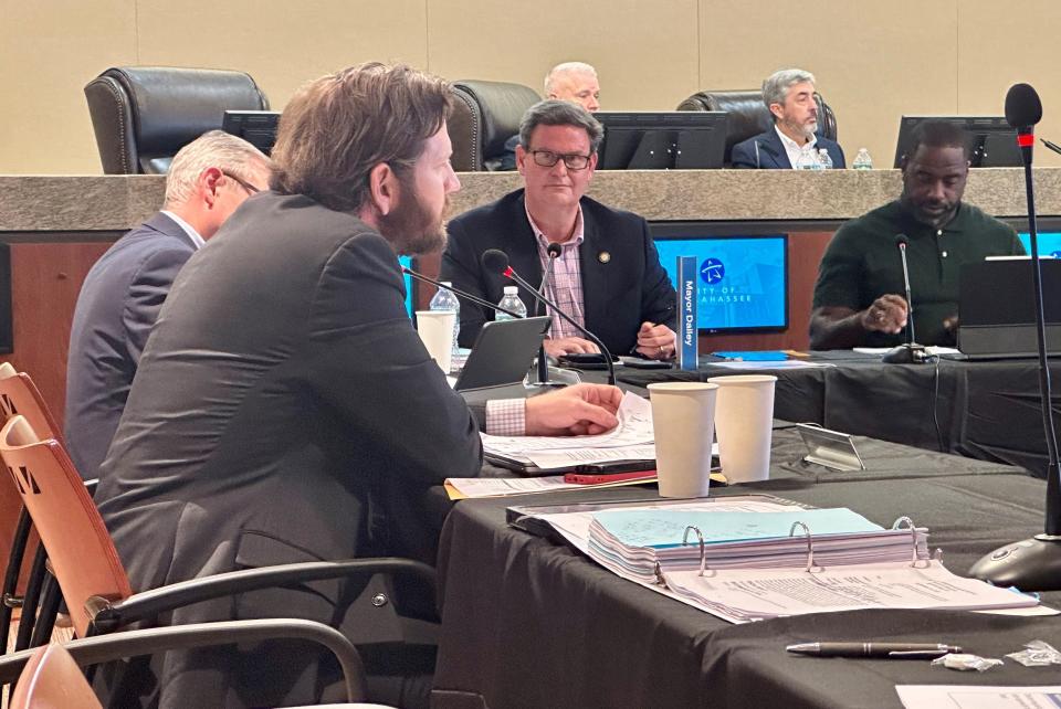 Mayor John Dailey listens as City Commissioner Jeremy Matlow asks questions about a $1.8 million appropriation for the SoMo Walls development during a meeting of the Blueprint Board of Directors on Thursday, Sept. 21, 2023.