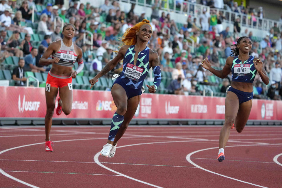 Sha'Carri Richardson, center, won the 100-meter final at the U.S. Olympic track and field trials on June 19.