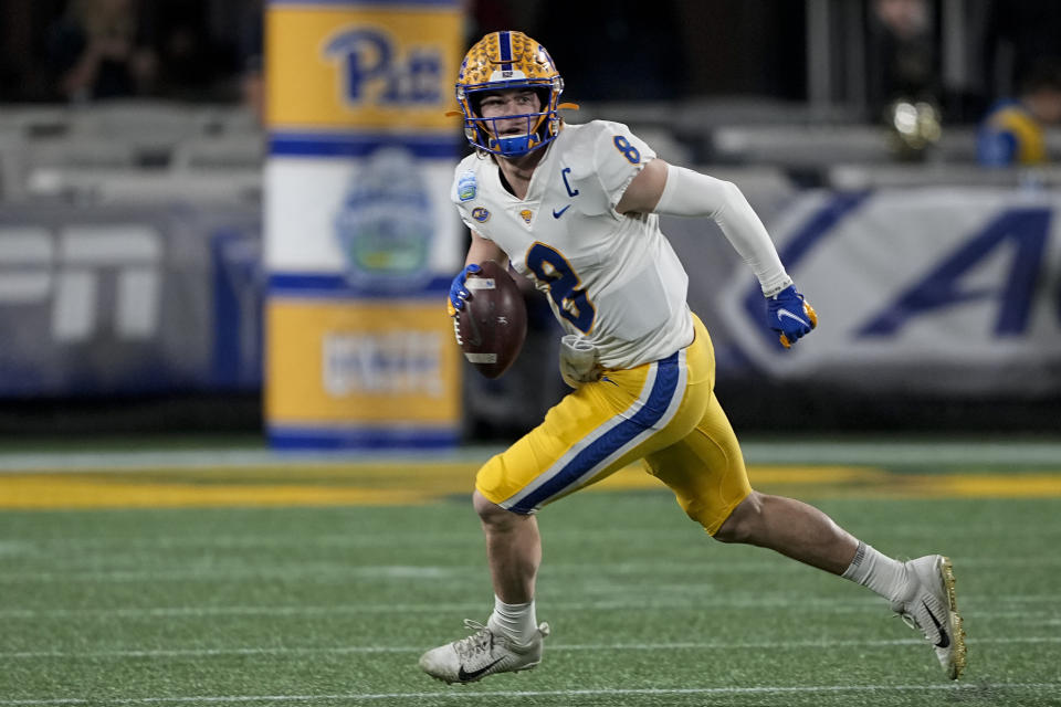 Pittsburgh quarterback Kenny Pickett looks to pass against Wake Forest during the first half of the Atlantic Coast Conference championship NCAA college football game Saturday, Dec. 4, 2021, in Charlotte, N.C. (AP Photo/Chris Carlson)