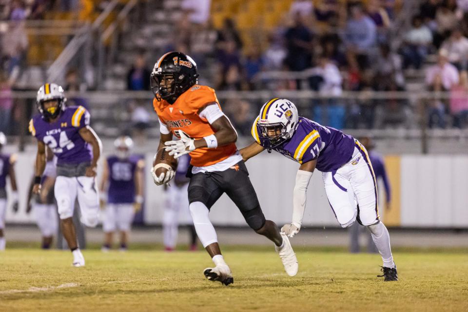 Hawthornes Terrell James runs the ball downfield during the first quarter against Union County at Union County High School in Lake Butler, FL on Friday, October 14, 2022. [Jesse Gann/Gainesville Sun]