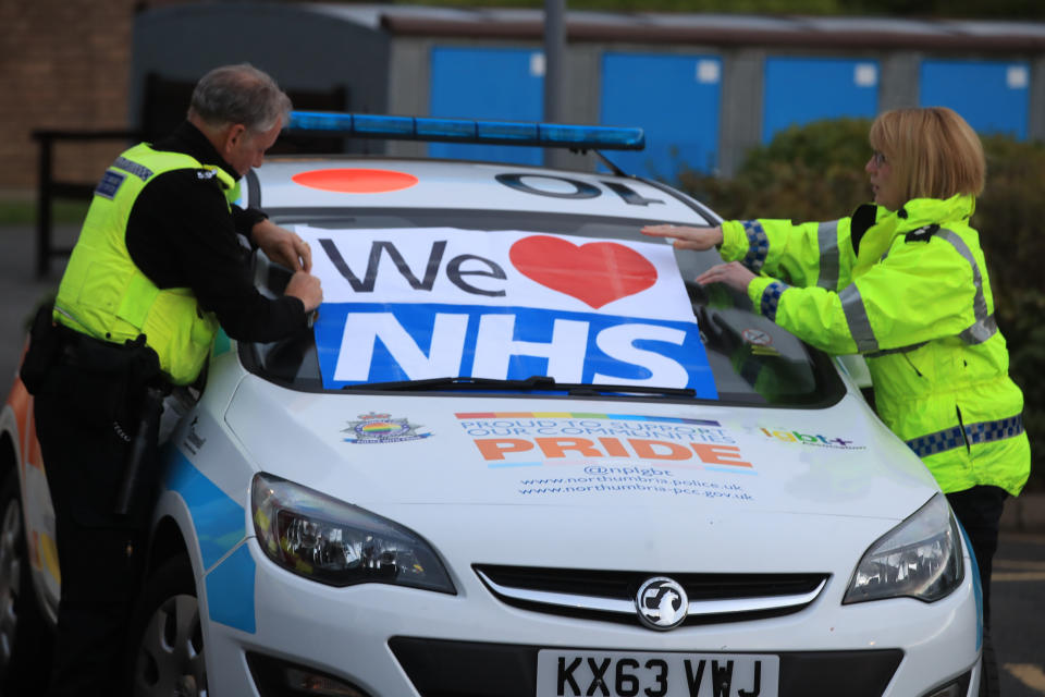 Staff put a sign on the windshield in support of the NHS at the Freeman Hospital in Newcastle upon Tyne, to salute local heroes during Thursday's nationwide Clap for Carers initiative to recognise and support NHS workers fighting the coronavirus pandemic.