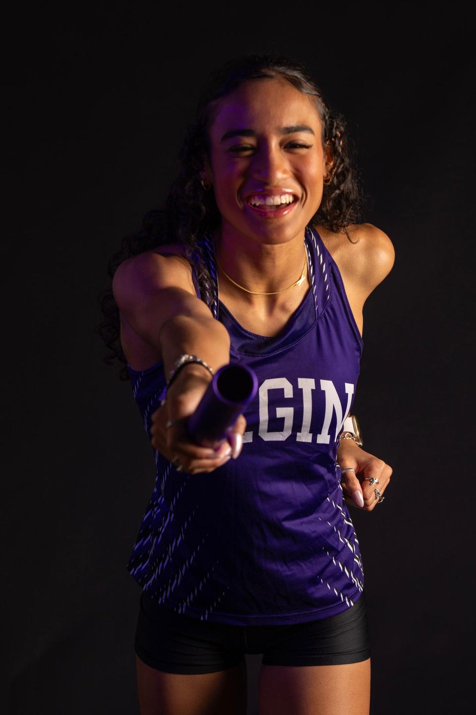 Elgin junior Kailyn Cook stays busy in the spring, competing in both soccer and track and field. She thinks soccer, with all its running up and down the field, helps get her ready for track.