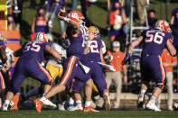 Clemson quarterback Trevor Lawrence (16) makes a pass during the first half of an NCAA college football game against Pittsburgh Saturday, Nov. 28, 2020, in Clemson, S.C. (Ken Ruinard/Pool Photo via AP)