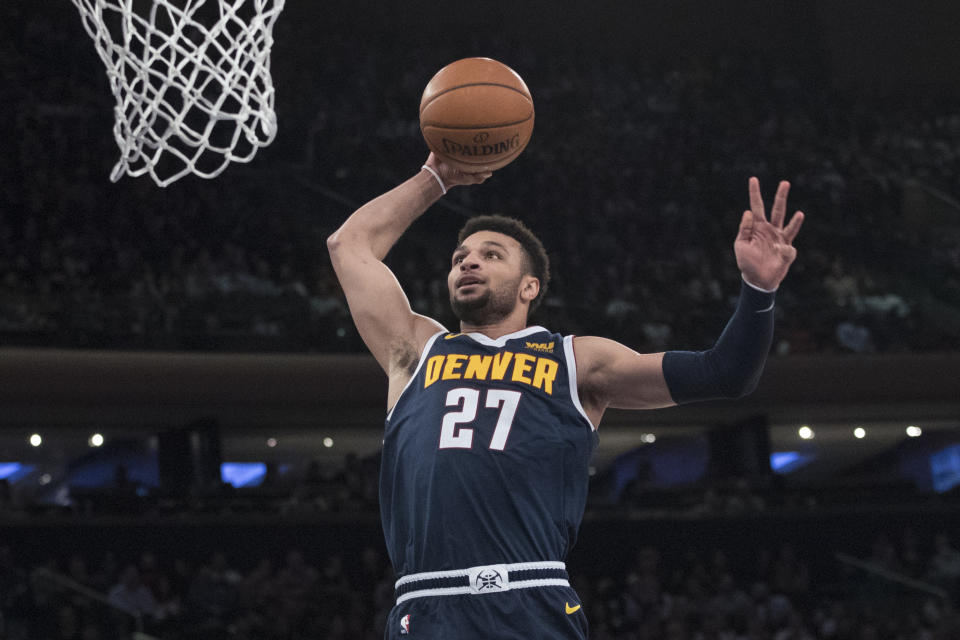 Denver Nuggets guard Jamal Murray dunks during the first half of an NBA basketball game against the New York Knicks, Friday, March 22, 2019, at Madison Square Garden in New York. (AP Photo/Mary Altaffer)